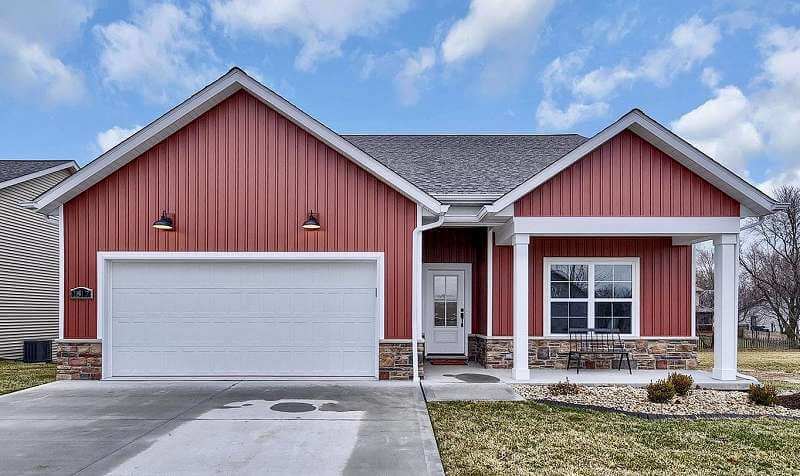 Exterior in Sherwin Williams Real Red with White Trim