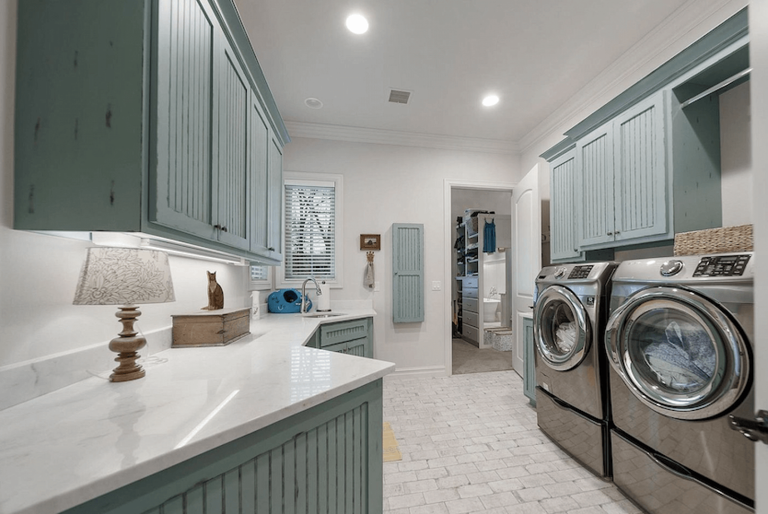 Distressed Finish on Cabinetry in Laundry